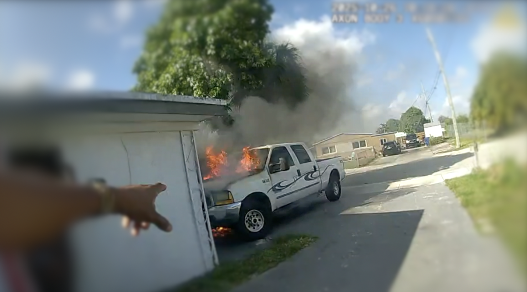 Body camera video captured the moments on Oct. 26, 2025, when a Riviera Beach officer helped a family escape their home after their truck caught fire.