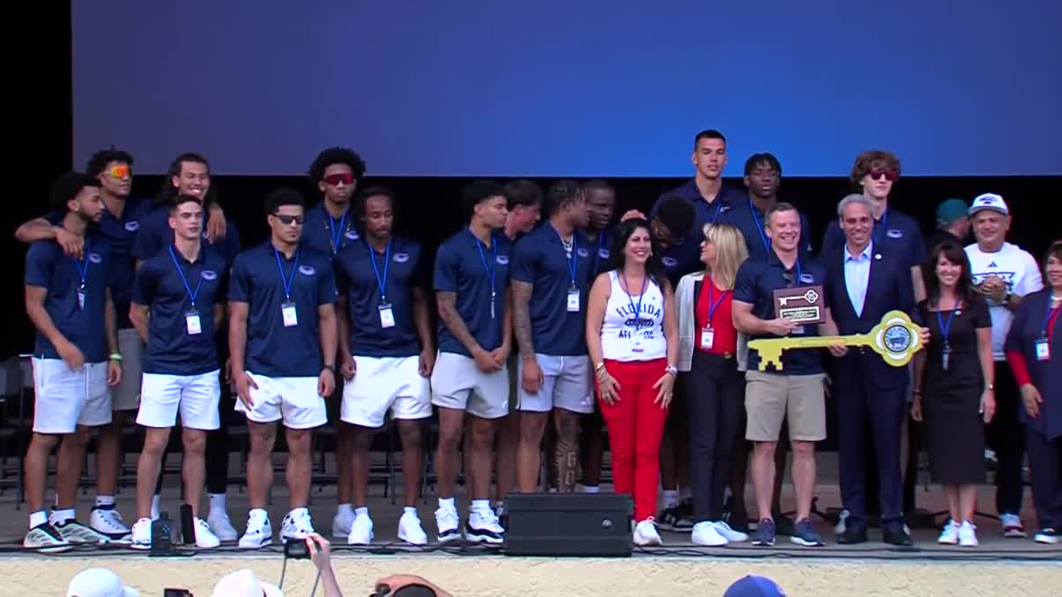 Florida Atlantic University men's basketball coach Dusty May and the team receive the key to the city from Boca Raton Mayor Scott Singer on April 19, 2023. 