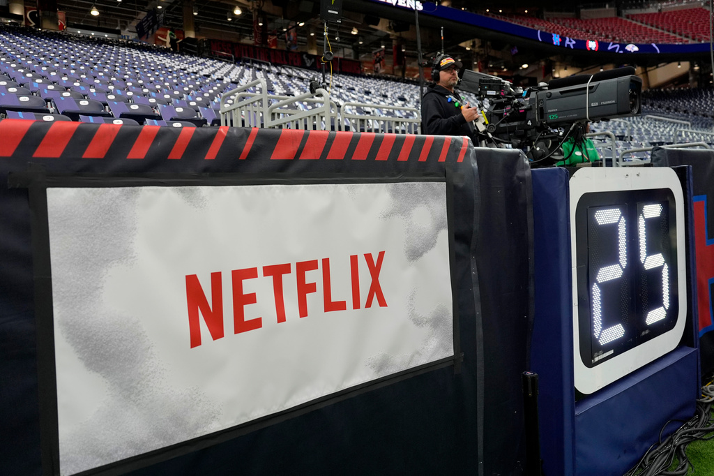 FILE - A Netflix banner is seen before an NFL football game between the Houston Texans and the Baltimore Ravens, Dec. 25, 2024, in Houston. 