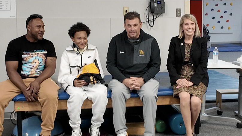  14-year-old football player surprised by college after devastating spinal injury