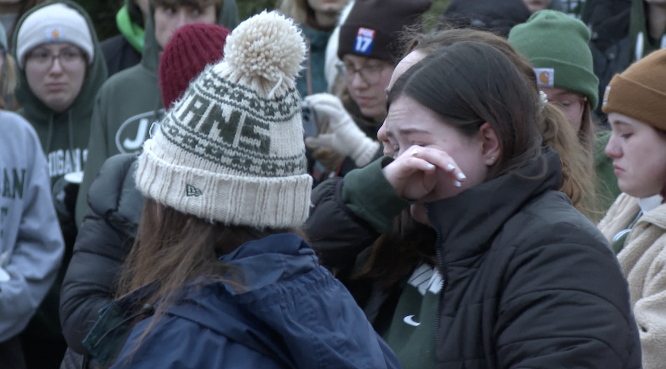 Thousands gathered around The Rock at Michigan State University for vigil honoring 3 students killed in mass shooting