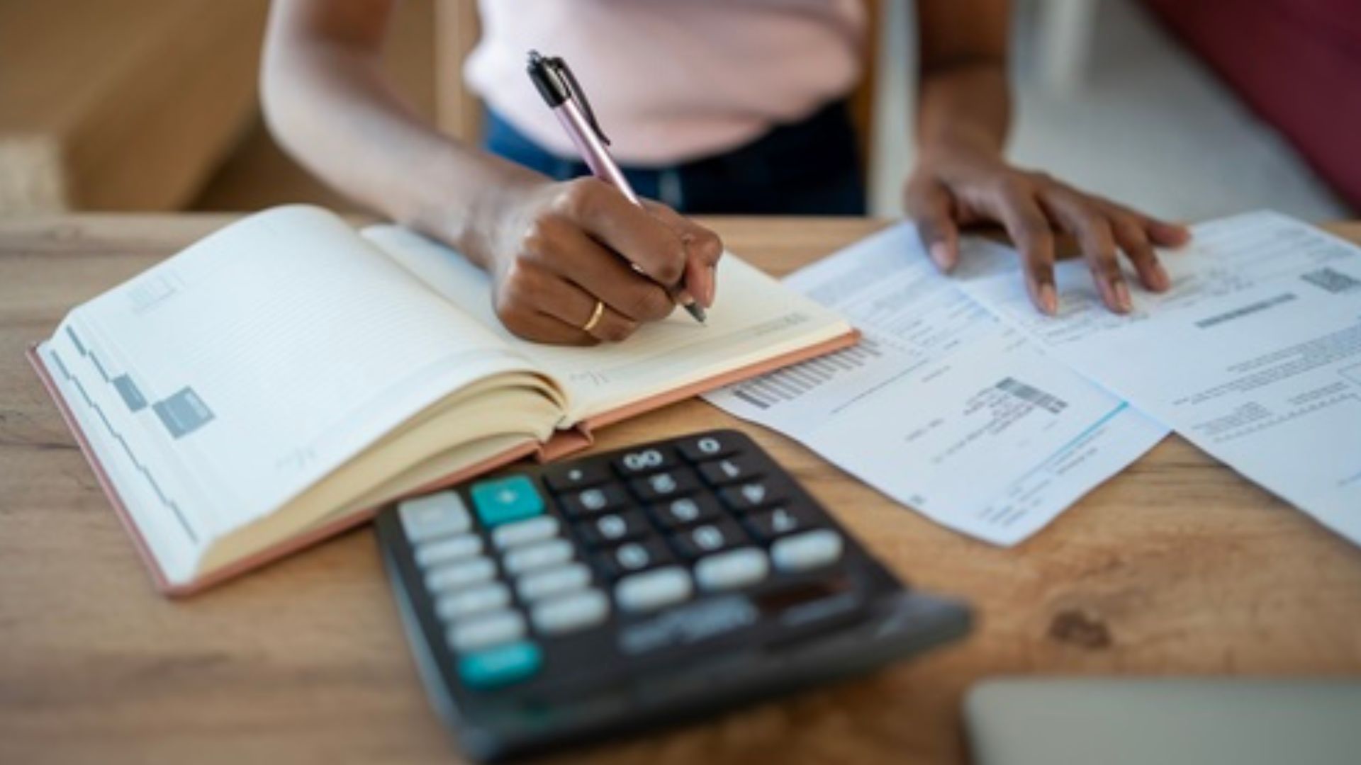 Stock image of a woman doing finances.