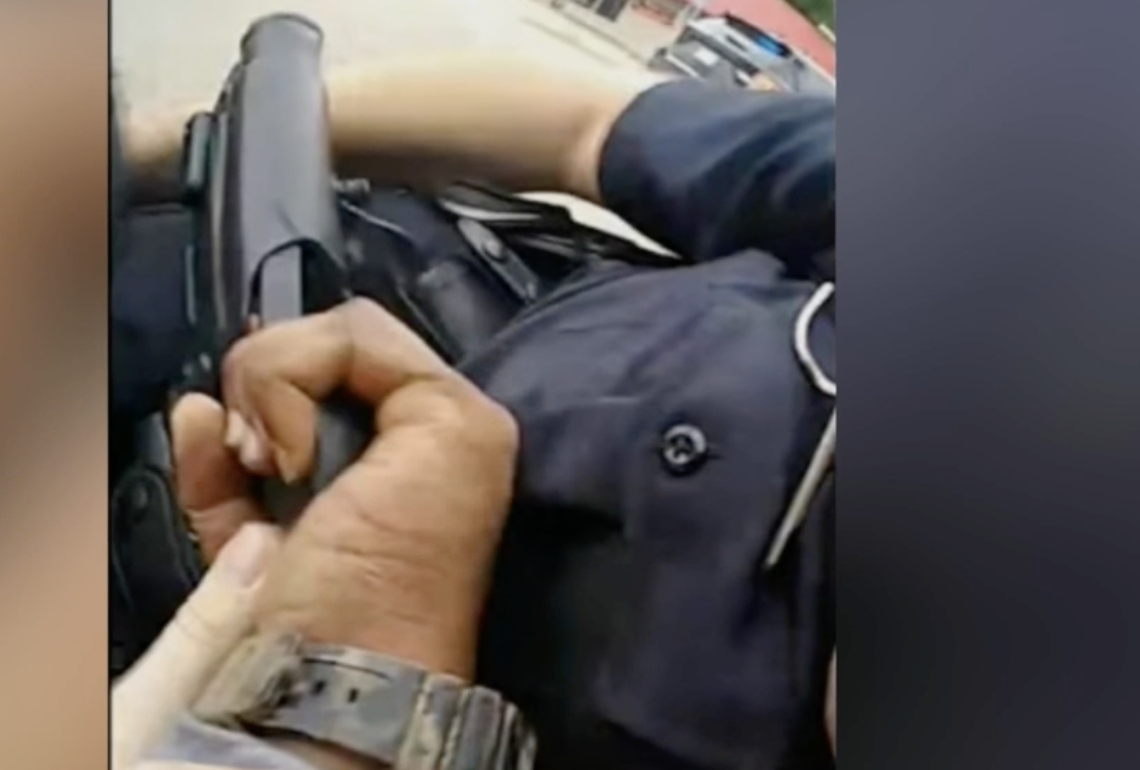 Man Fires Officer's Weapon
