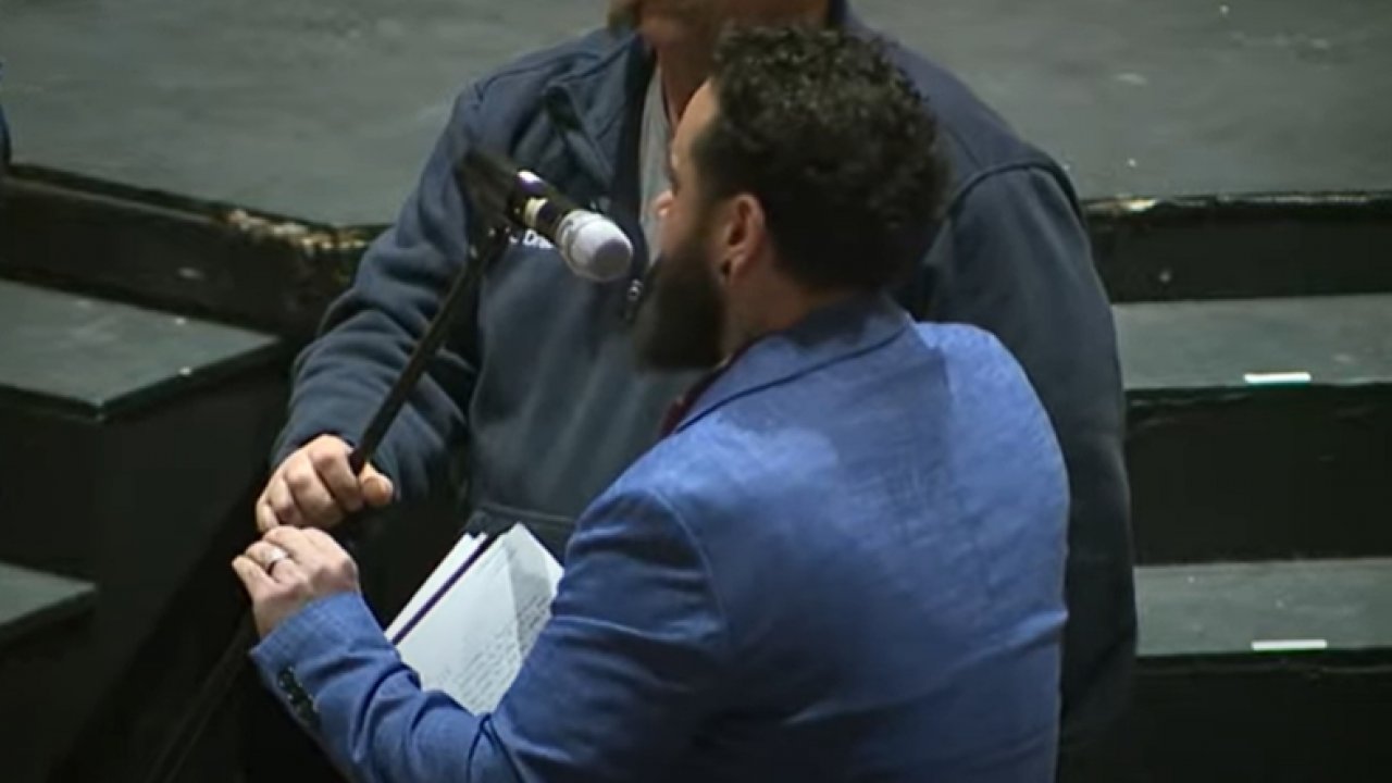 Person speaks at meeting