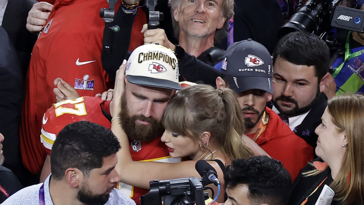 Kansas City Chiefs tight end Travis Kelce (87) is embraced by Taylor Swift after the Chiefs defeated the San Francisco 49ers.