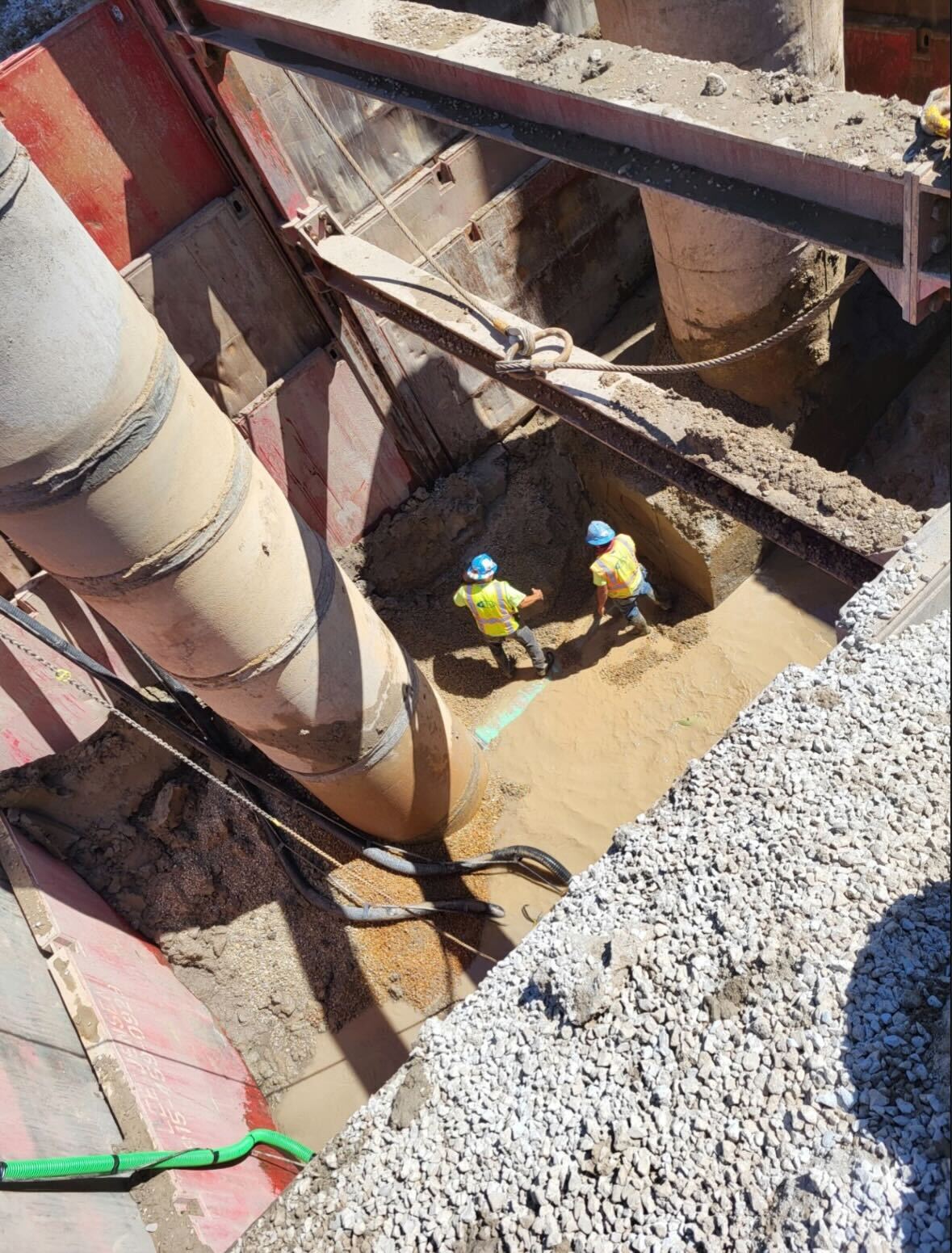 Crews deep underground working to repair a sinkhole on Puetz Road. 