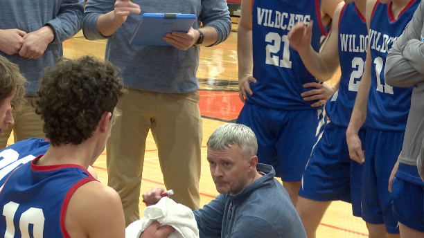 Columbia Falls coach Chris Finberg huddled during timeout, Ronan