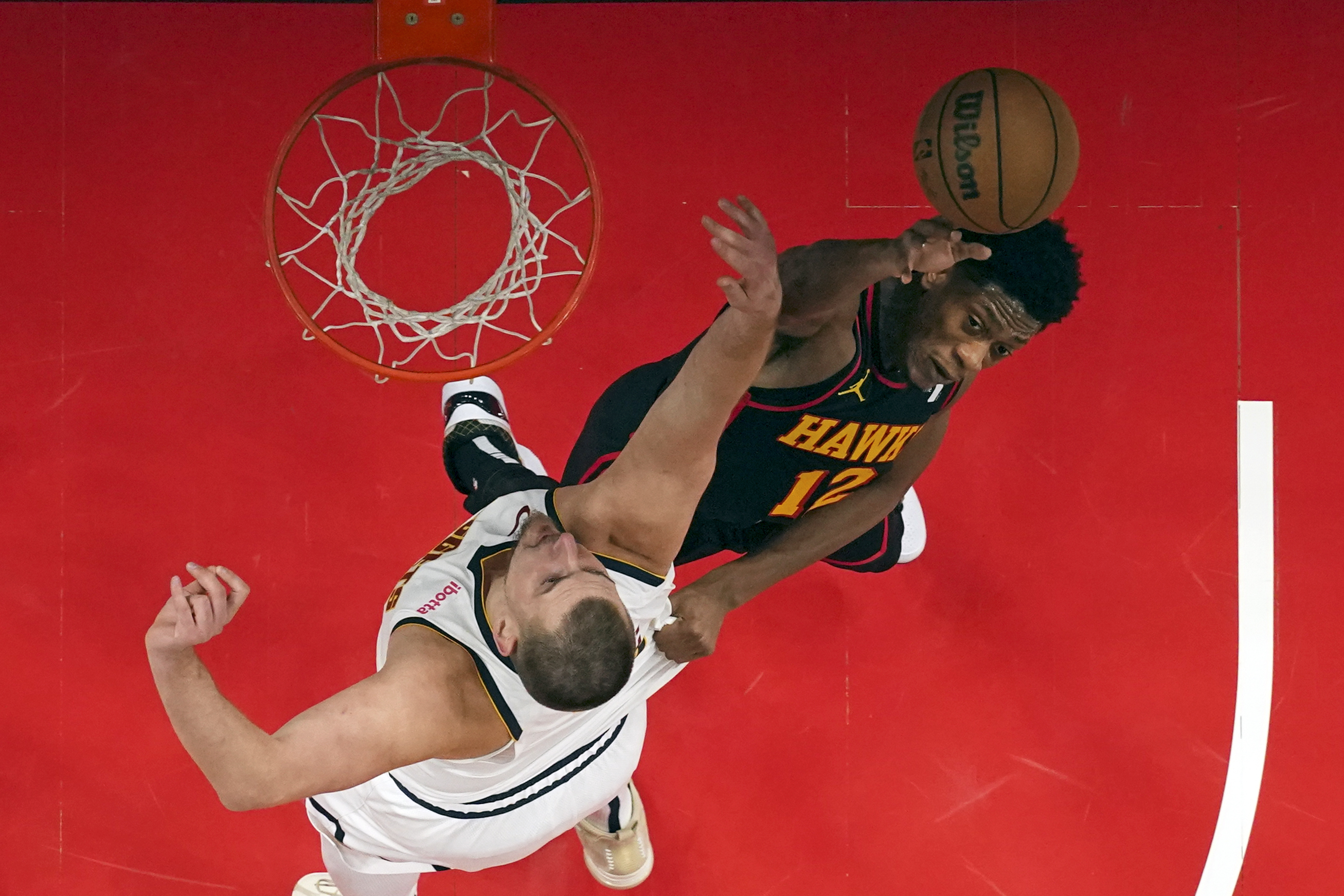 APTOPIX Nuggets Hawks Basketball