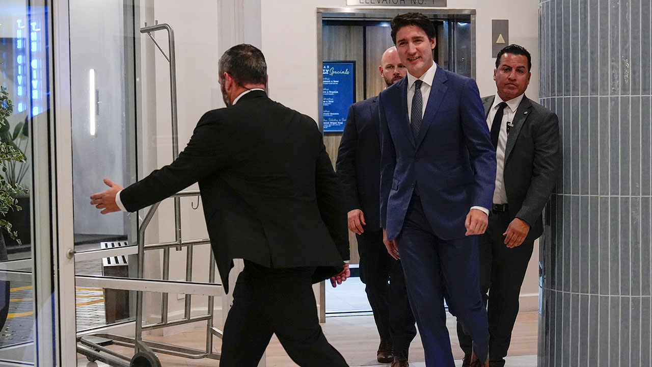 Canadian Prime Minister Justin Trudeau walks through the lobby of the Delta Hotel by Marriott, Friday, Nov. 29, 2024, in West Palm Beach, Fla.