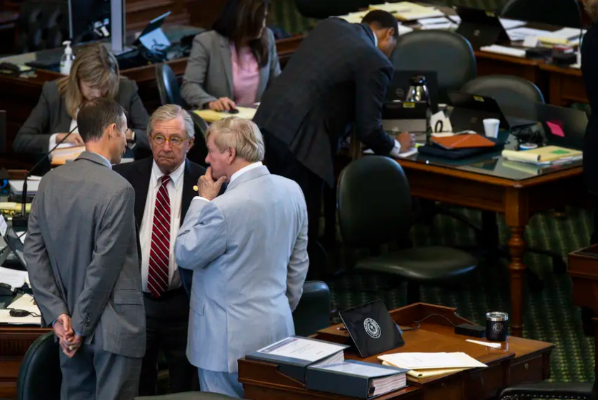 From left, Texas House impeachment manager Andrew Murr, R-Junction, speaks with prosecution lawyers Dick DeGuerin and Rusty Hardin during a short recess on the second day of the impeachment trial for Attorney General Ken Paxton on Sept. 6, 2023 in Austin. The Senate acquitted Paxton. 