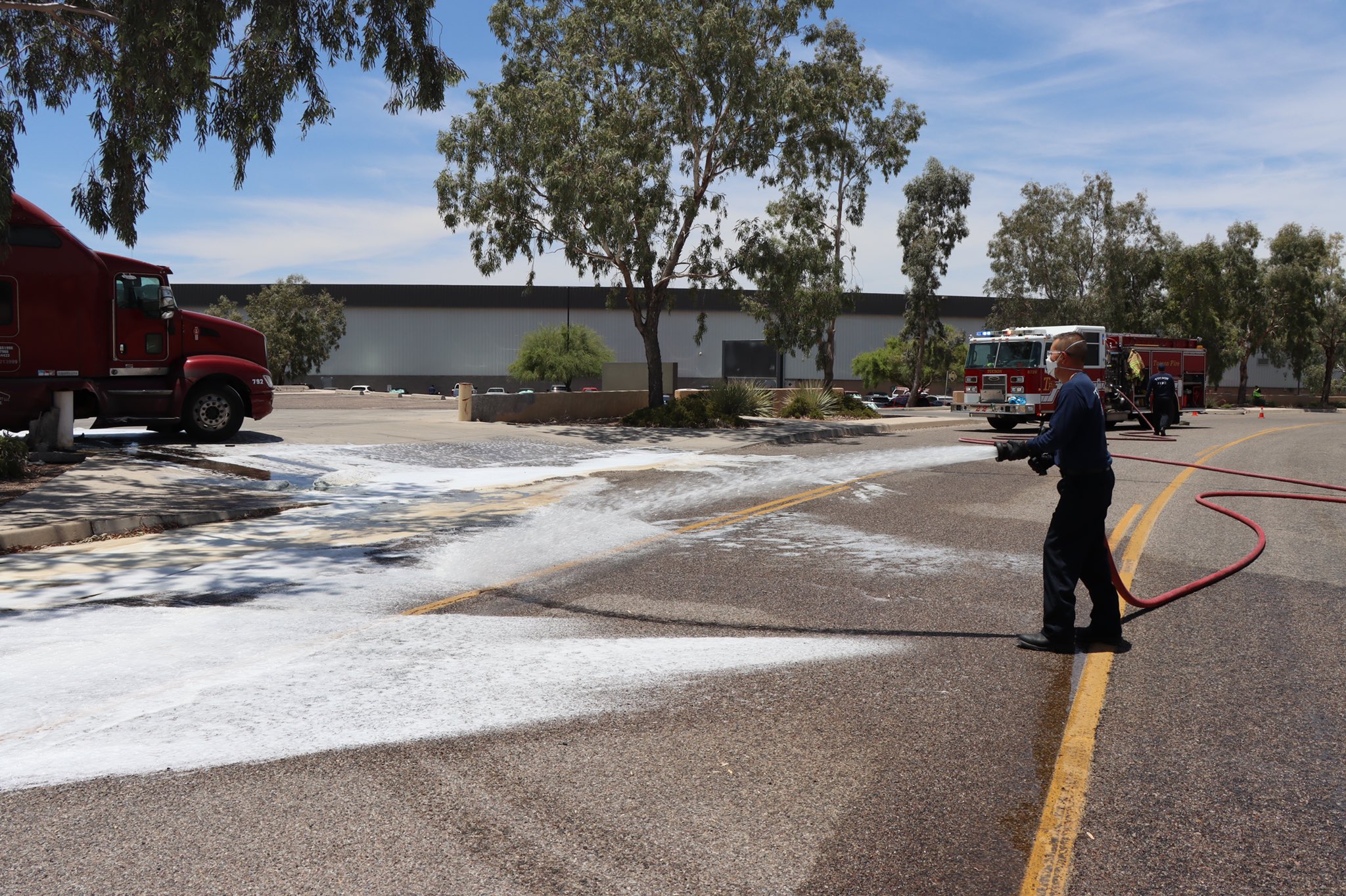 Tucson Fire's Hazardous Waste Disposal Unit worked to contain a diesel spill on South Memorial Place Wednesday.