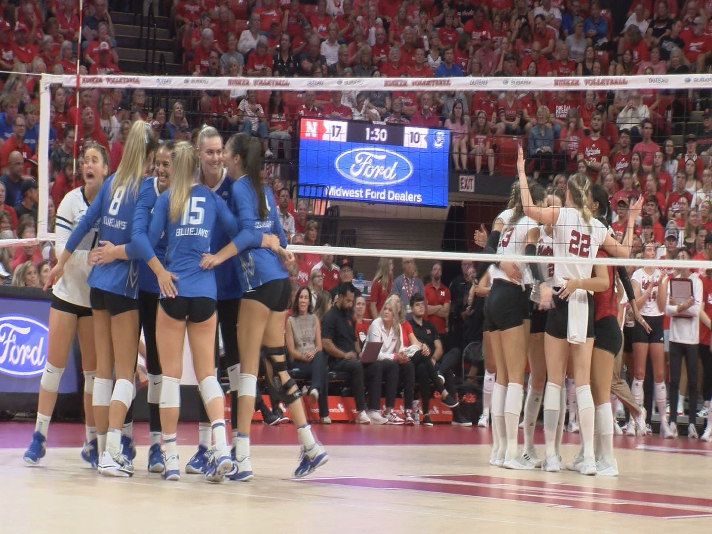 Nebraska and Creighton volleyball huddle during their match Wednesday, Sept. 6 at the Devaney Center in Lincoln.