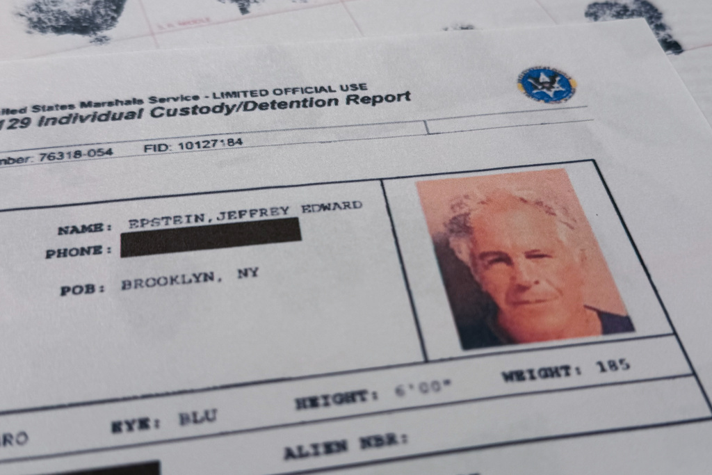 A document that was included in the U.S. Department of Justice release of the Jeffrey Epstein files is photographed Sunday, Feb. 1, 2026, shows the report when Epstein was taken into custody on July 6, 2019. 