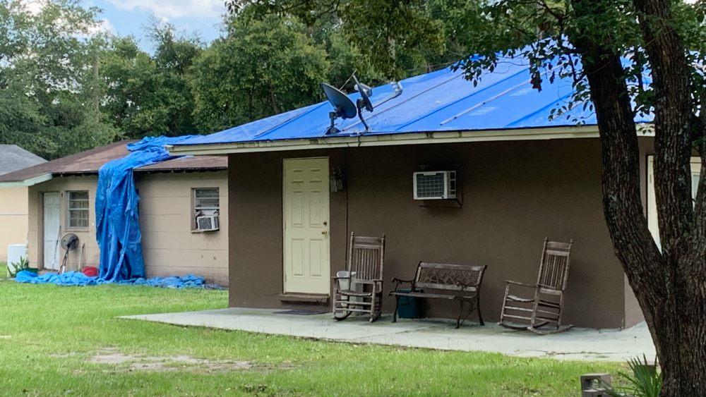 tarp on Plant City roof 2
