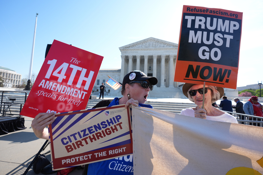Pro and anti-Trump demonstrators rally outside the U.S. Supreme Court, before justices hear oral arguments on whether President Donald Trump can deny citizenship to children born to parents who are in the United States illegally or temporarily, on Capitol Hill, in Washington, Wednesday, April 1, 2026. 