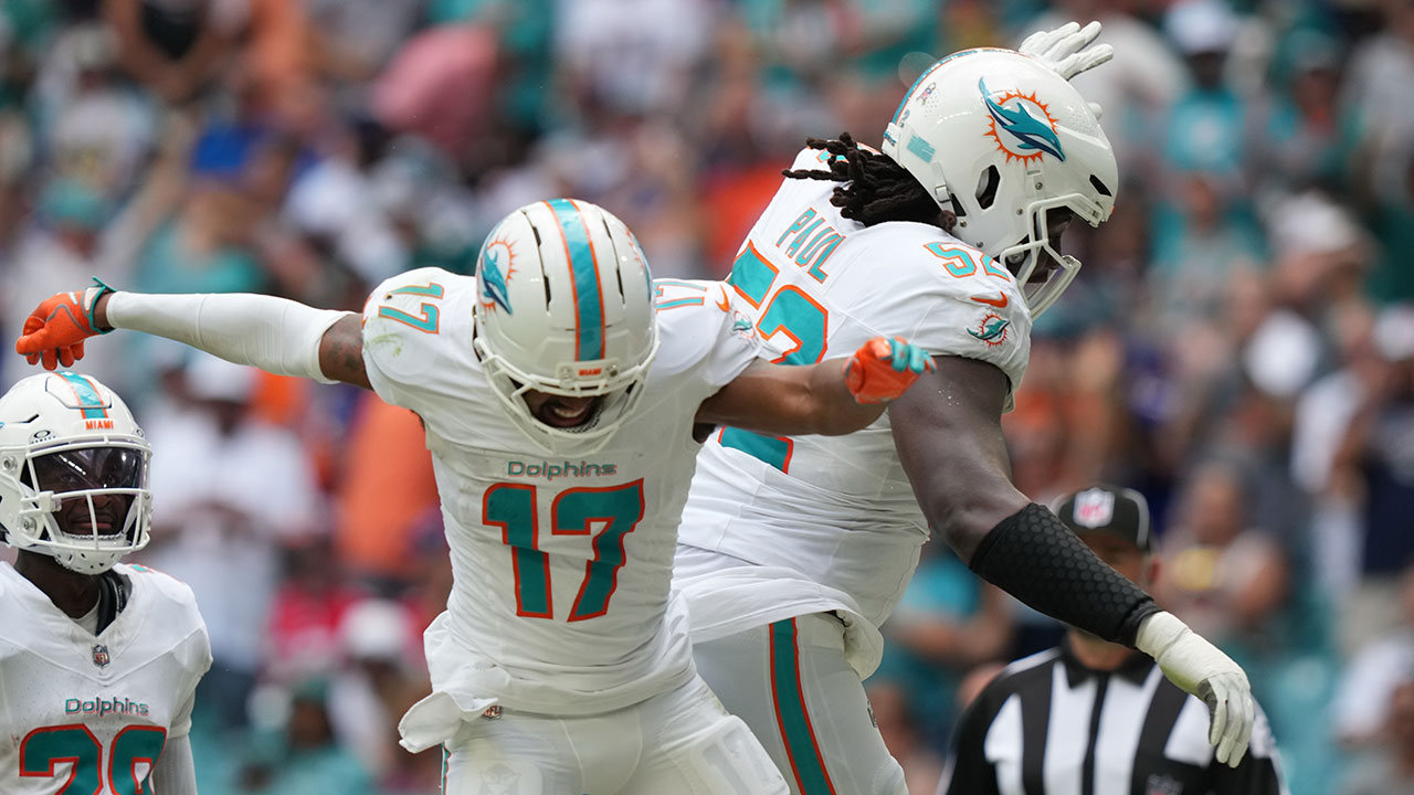 Miami Dolphins' Jaylen Waddle celebrates a touchdown during the first half of an NFL football game against the Buffalo Bills, Sunday, Nov. 9, 2025, in Miami Gardens, Fla.