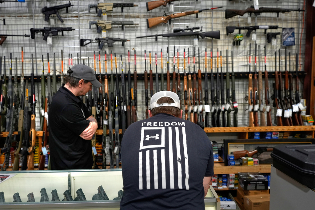 A customer shops at Maine Military Supply in Holden, Maine.