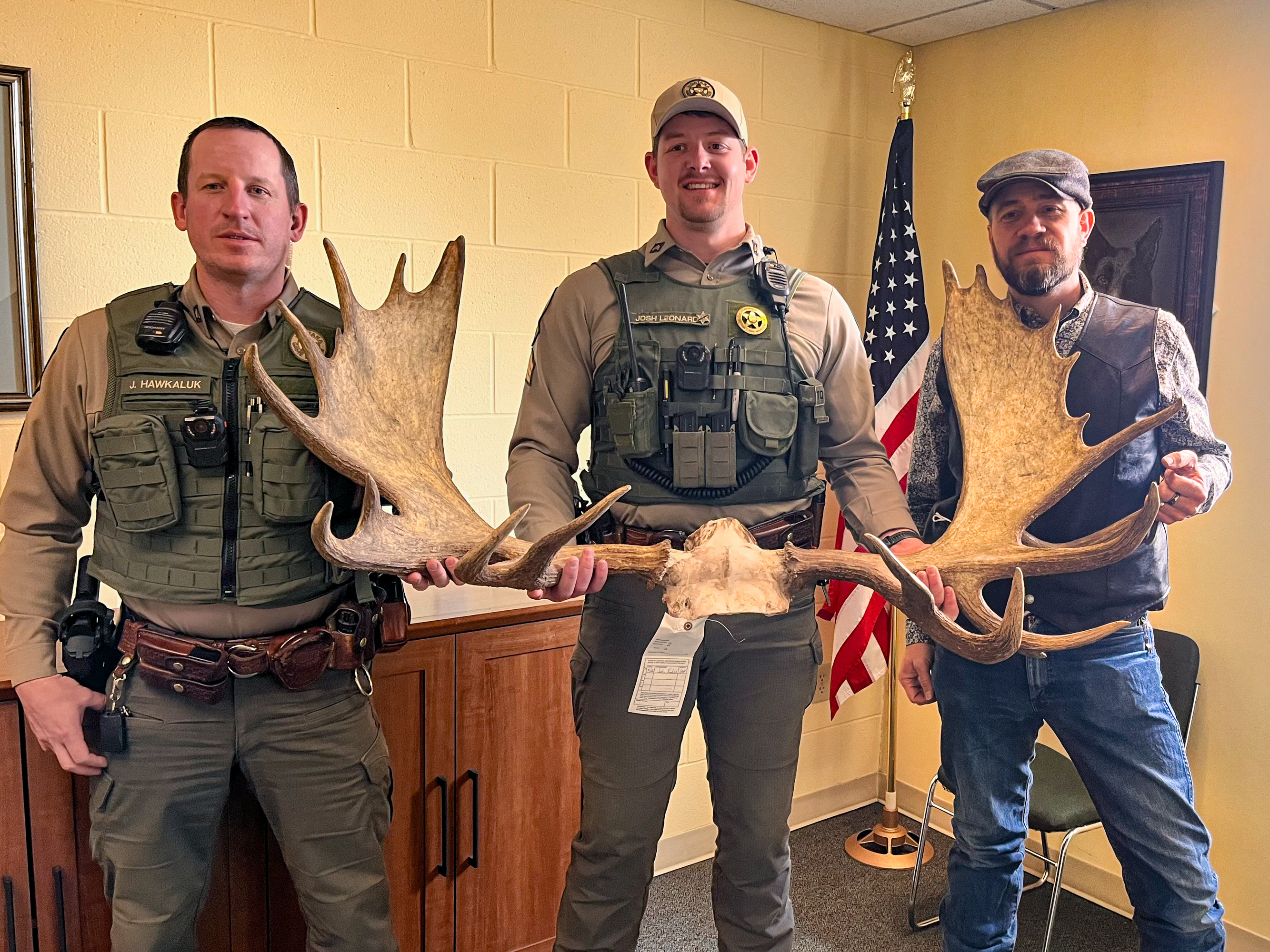 FWP Wardens with moose antlers