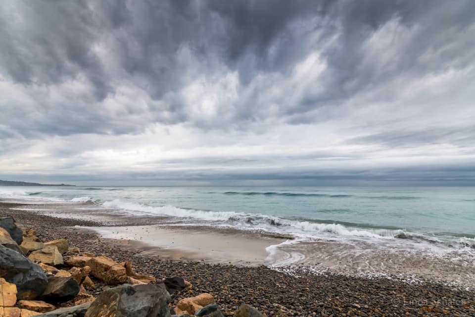 Storm clouds hover over Torrey Pines State Natural Reserve & State Beach