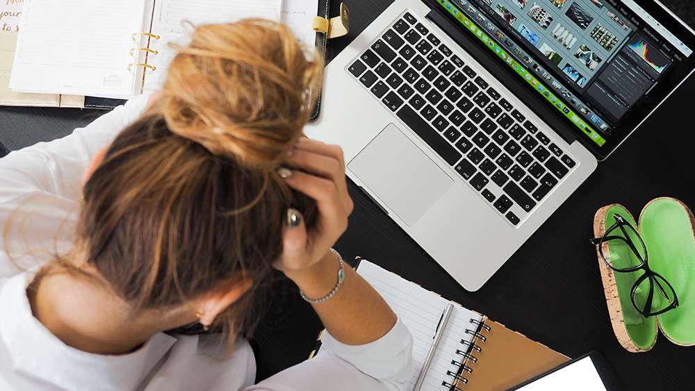 stressed-pexels-computer-headache.png