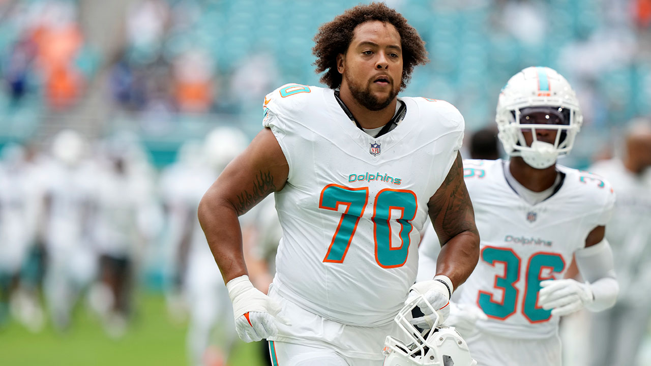 Miami Dolphins offensive tackle Kendall Lamm (70) goes off the field before an NFL football game against the Las Vegas Raiders, Sunday, Nov. 17, 2024, in Miami Gardens, Fla.