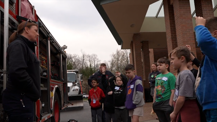 Forest Hills students ask firefighters about their day-to-day duties 