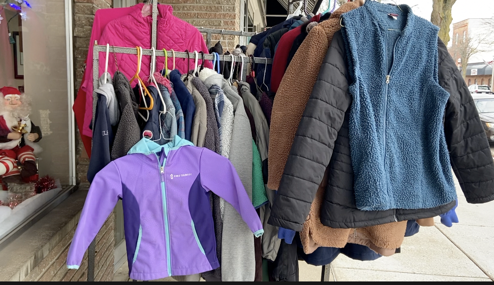 Insurance agency employees offer free winter gear for people in need