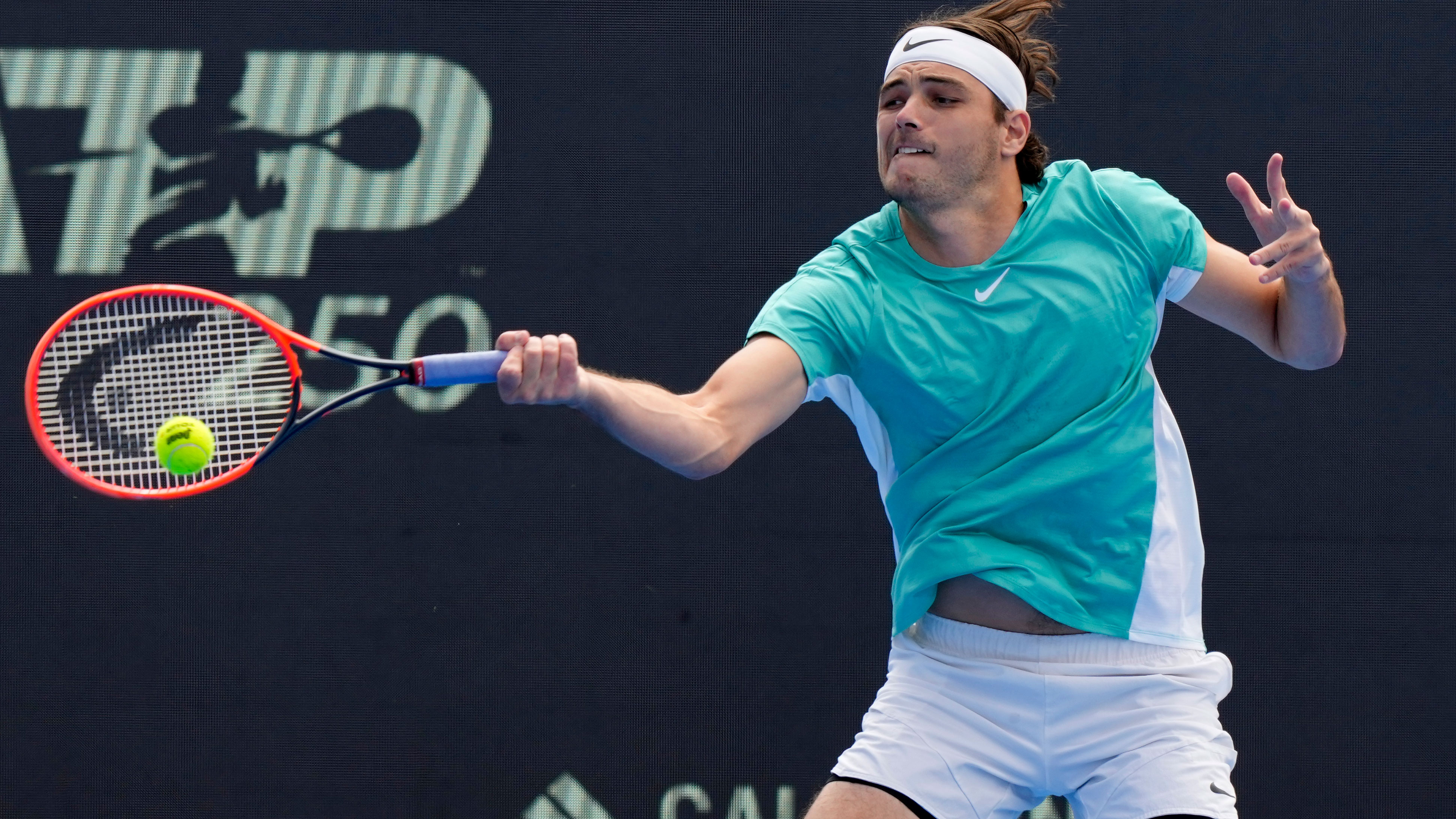 Taylor Fritz hits a return to Tommy Paul during the final match at the Delray Beach Open tennis tournament, Monday, Feb. 19, 2024, in Delray Beach, Fla. 