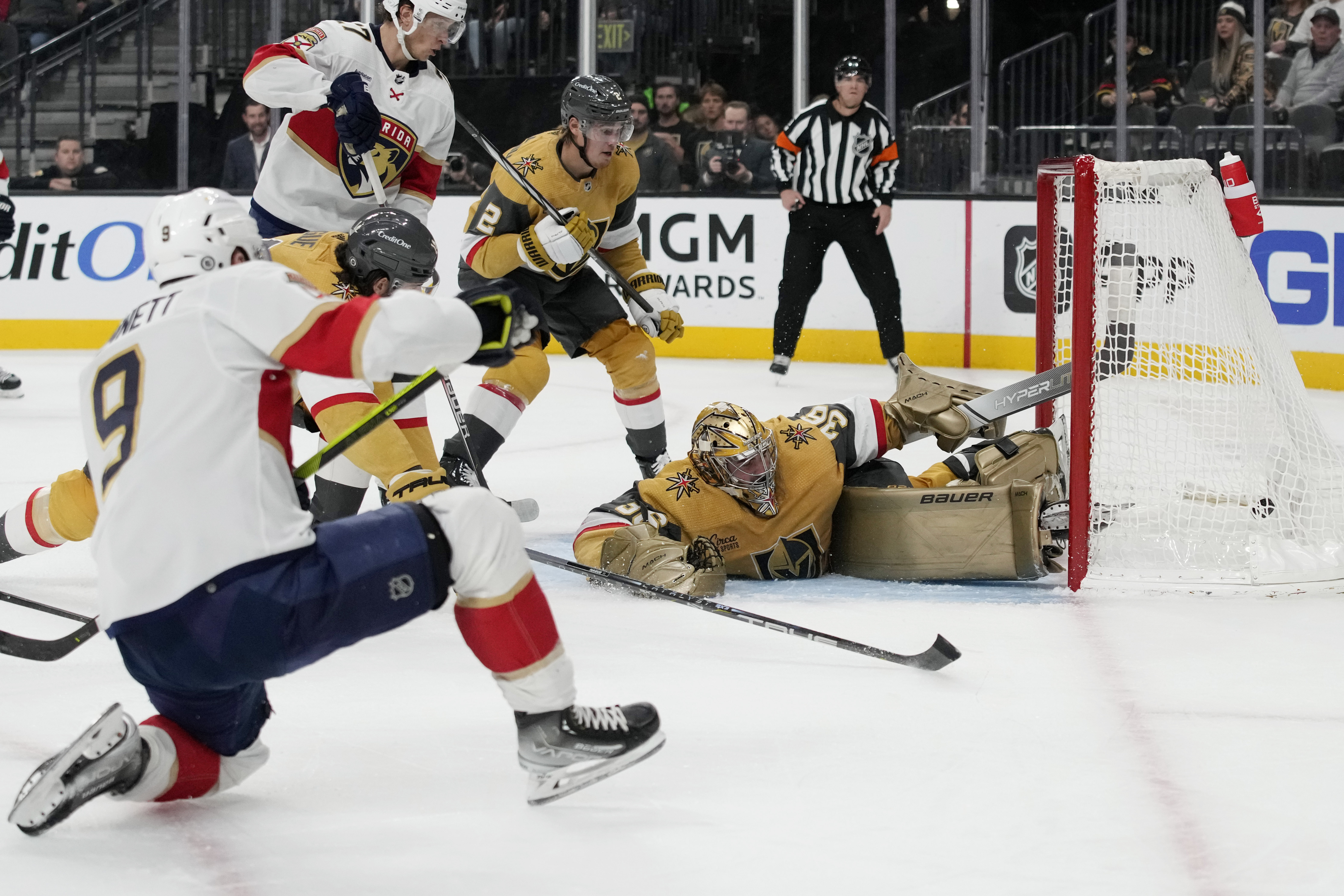 Florida Panthers center Sam Bennett (9) scores on Vegas Golden Knights goaltender Logan Thompson (36) during the first period of an NHL hockey game Thursday, Jan. 4, 2024, in Las Vegas. (AP Photo/John Locher)