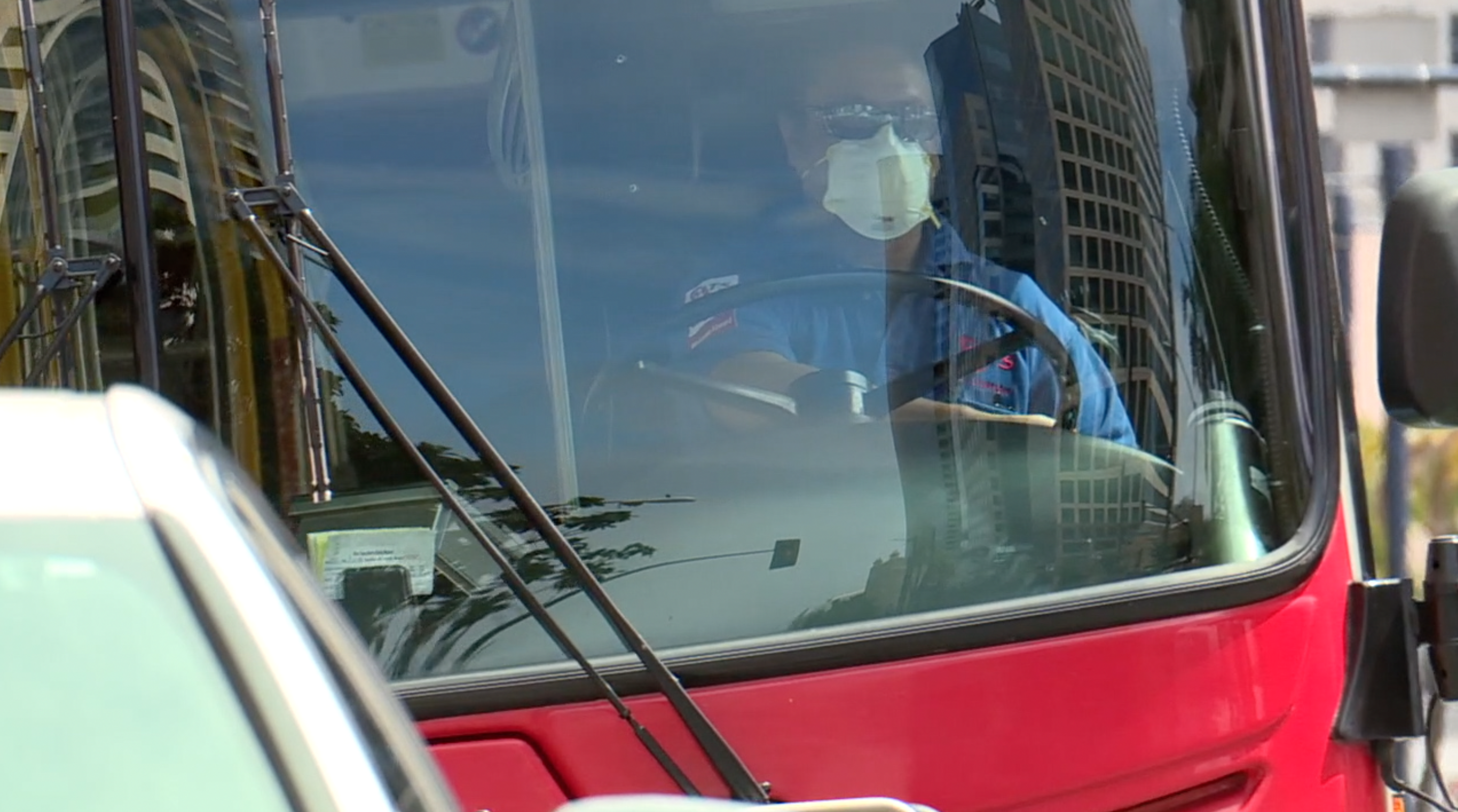MTS bus driver with face mask