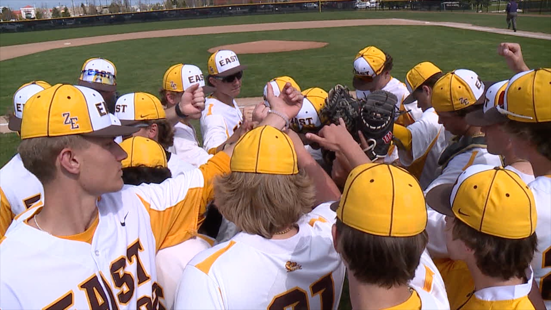 Zeeland East baseball team huddle