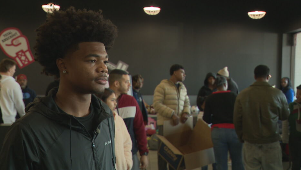 Antioch High School quarterback and brothers host holiday gift giveaway for community