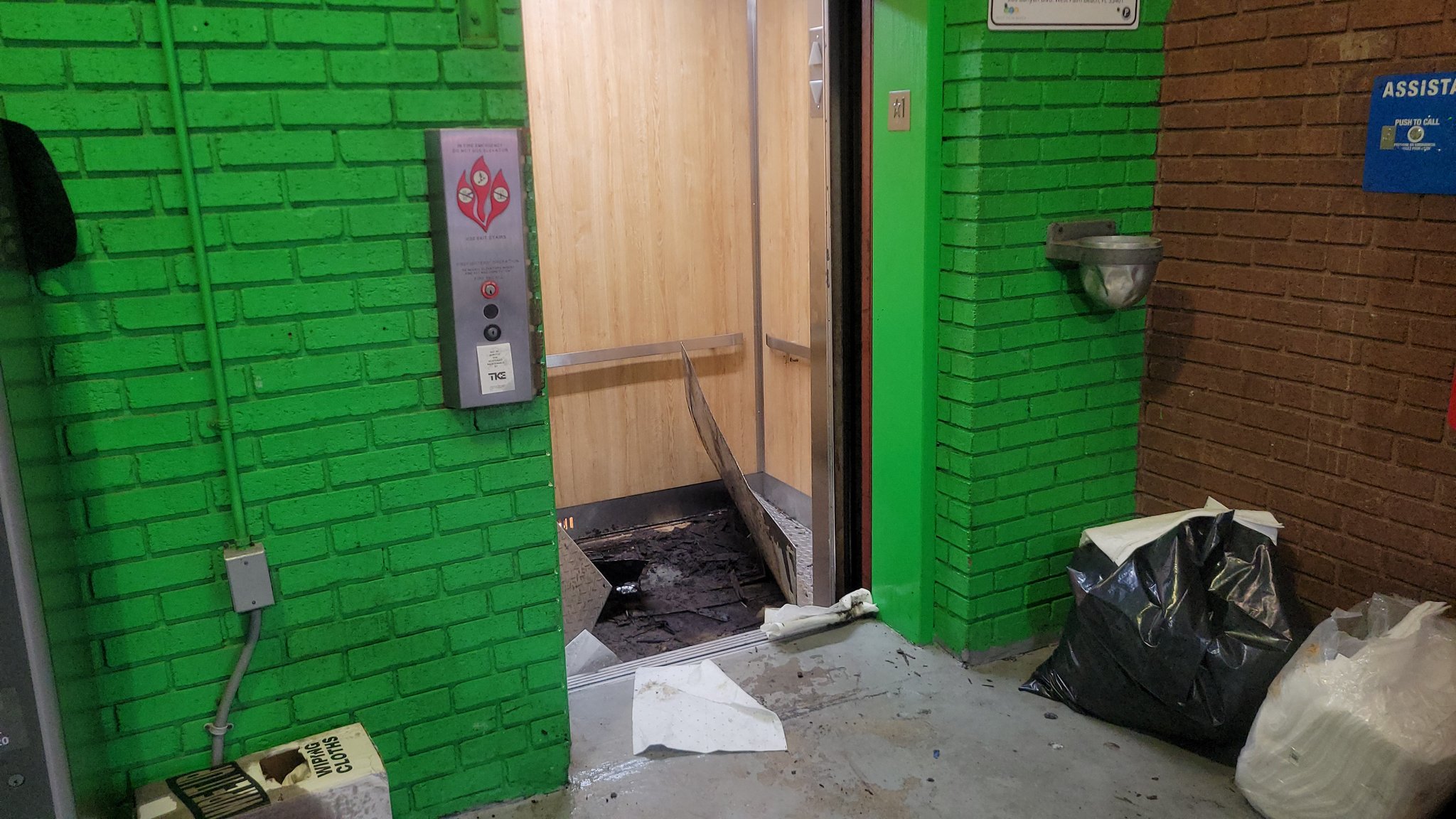 elevator parking garage West Palm Beach worker injured 01042024