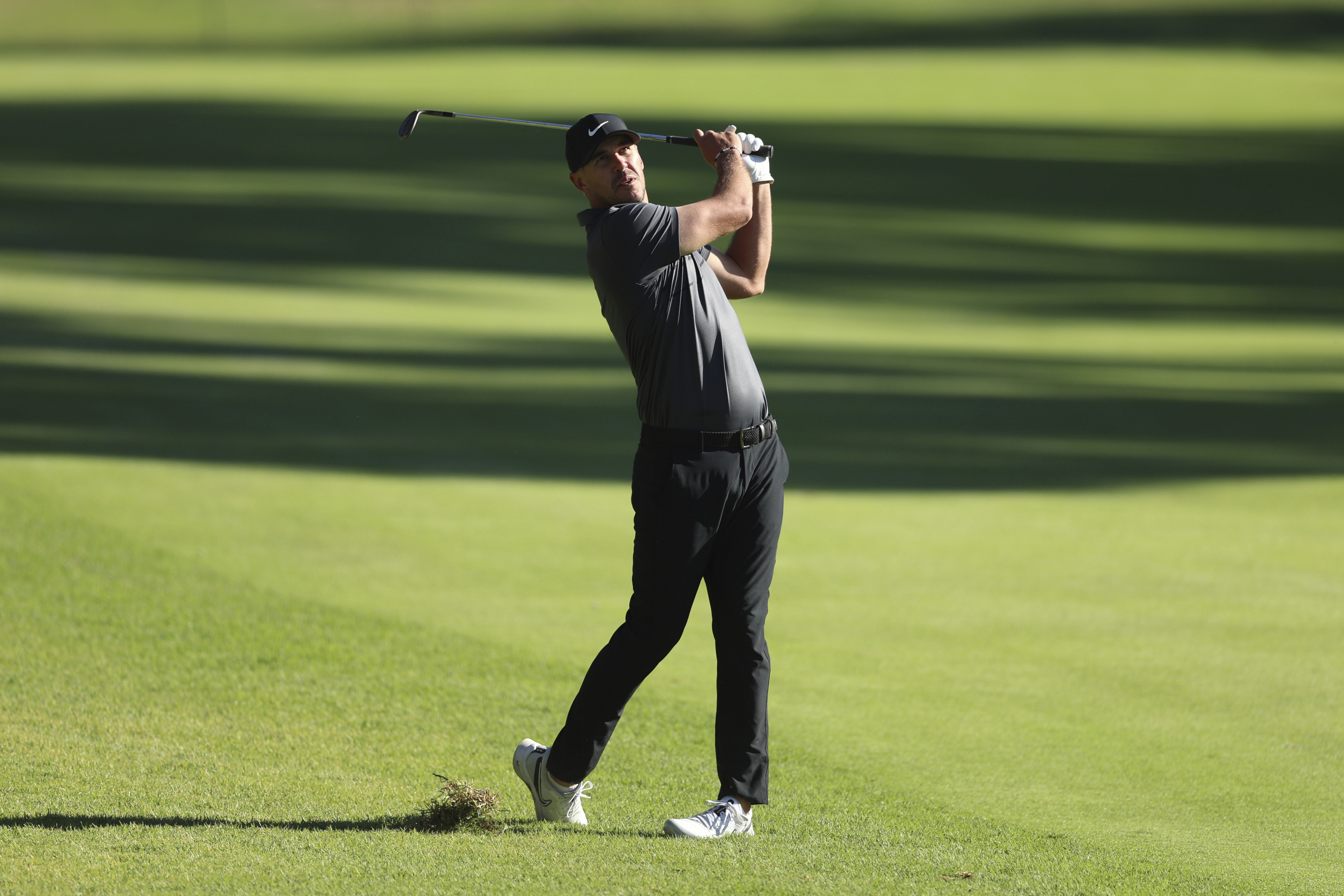 Brooks Koepka swings at 2022 Genesis Invitational