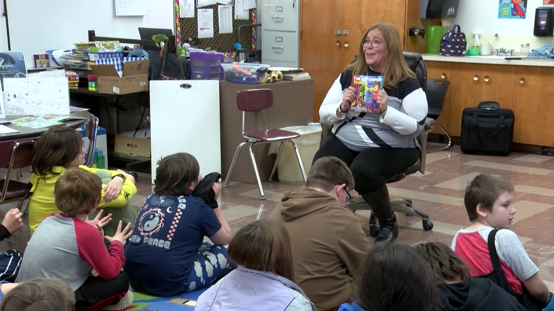 Great Falls author shares her book with students