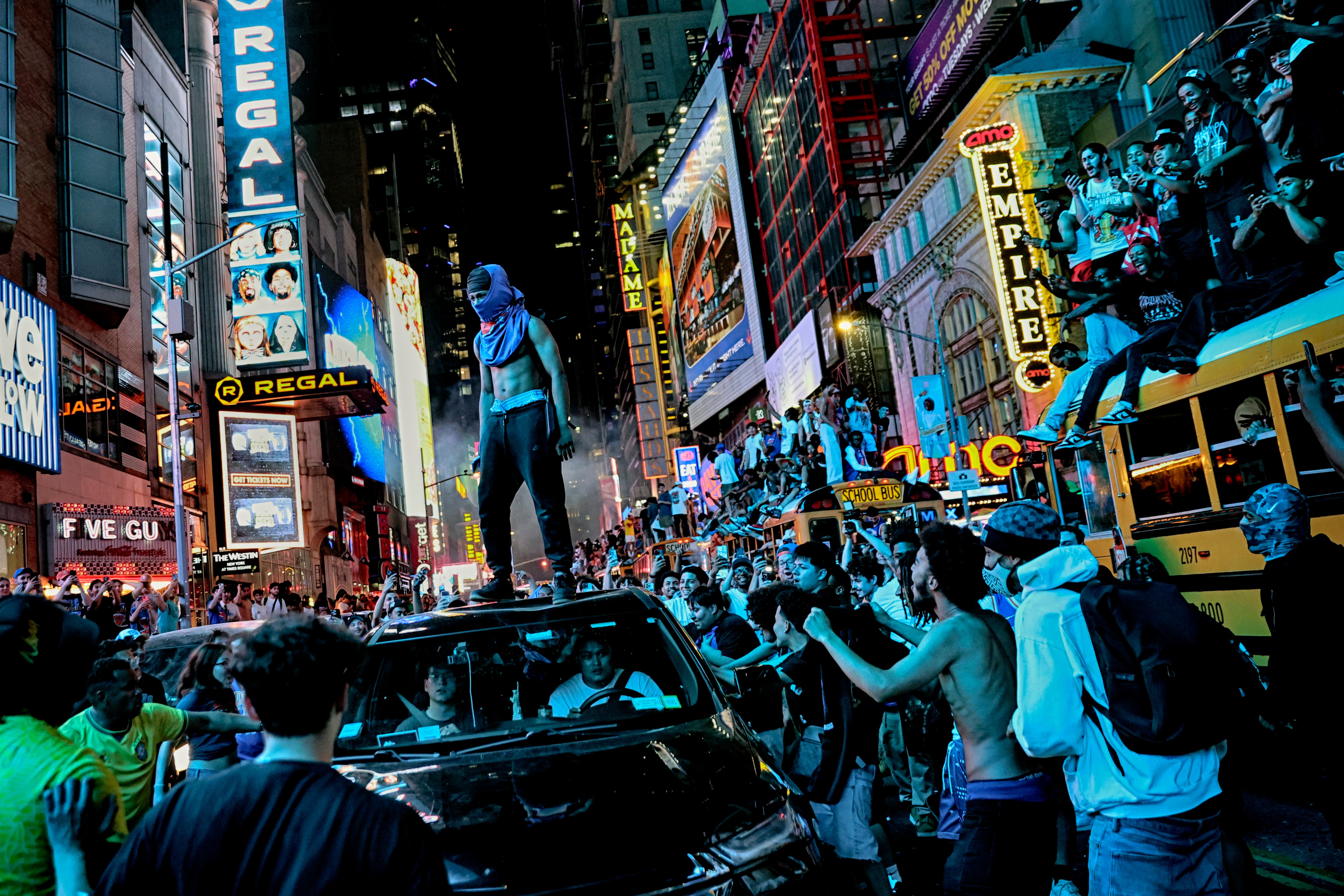 New York Knicks fans celebrate their victory after Game 5 of the NBA Finals basketball series against the San Antonio Spurs, Saturday, June 13, 2026, in New York.