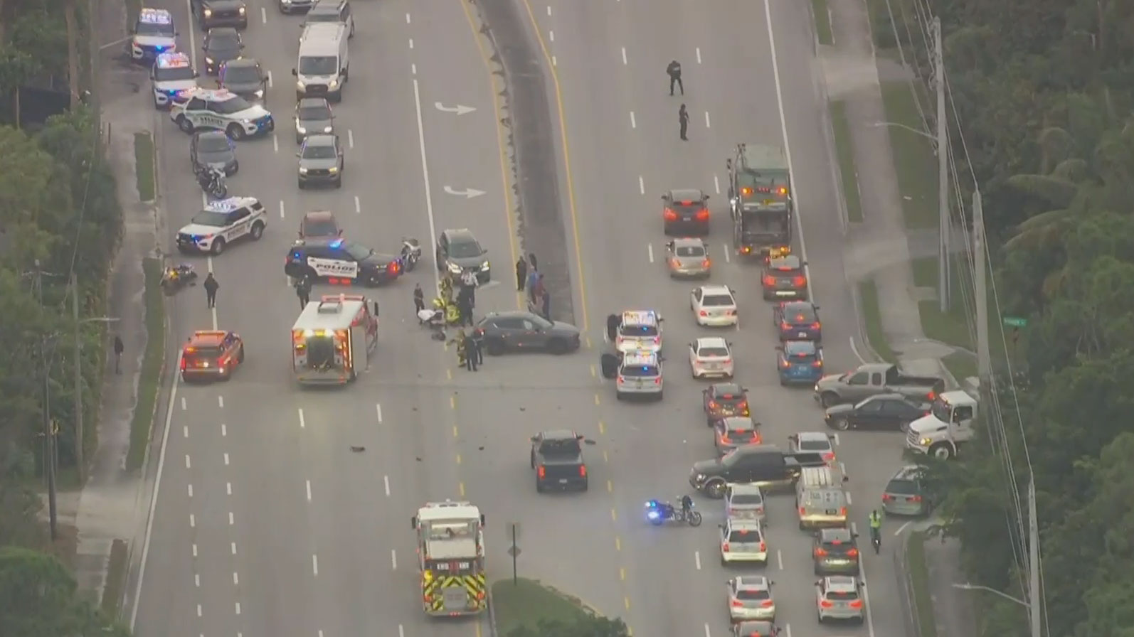 There was a heavy law enforcement presence on Jog Road near Pioneer Road on Nov. 29, 2023, after a Palm Beach County Sheriff's Office motorcycle deputy was hurt in a collision with a pickup truck.