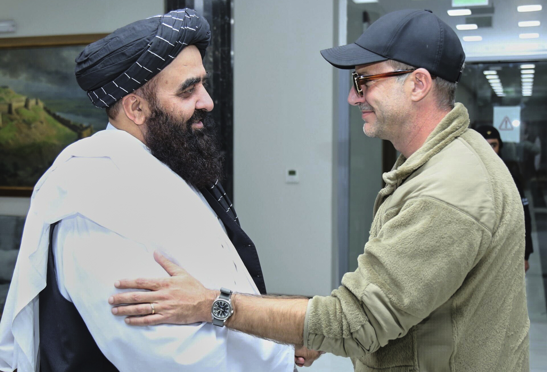In this photo released by the Taliban Foreign Ministry Press Service, Amir Khan Muttaqi, left, the acting foreign minister of the Taliban government, meets with Adam Boehler, the U.S. president's special envoy for Detainee Affairs, in Kabul, Afghanistan, Saturday, Sept. 13, 2025. 