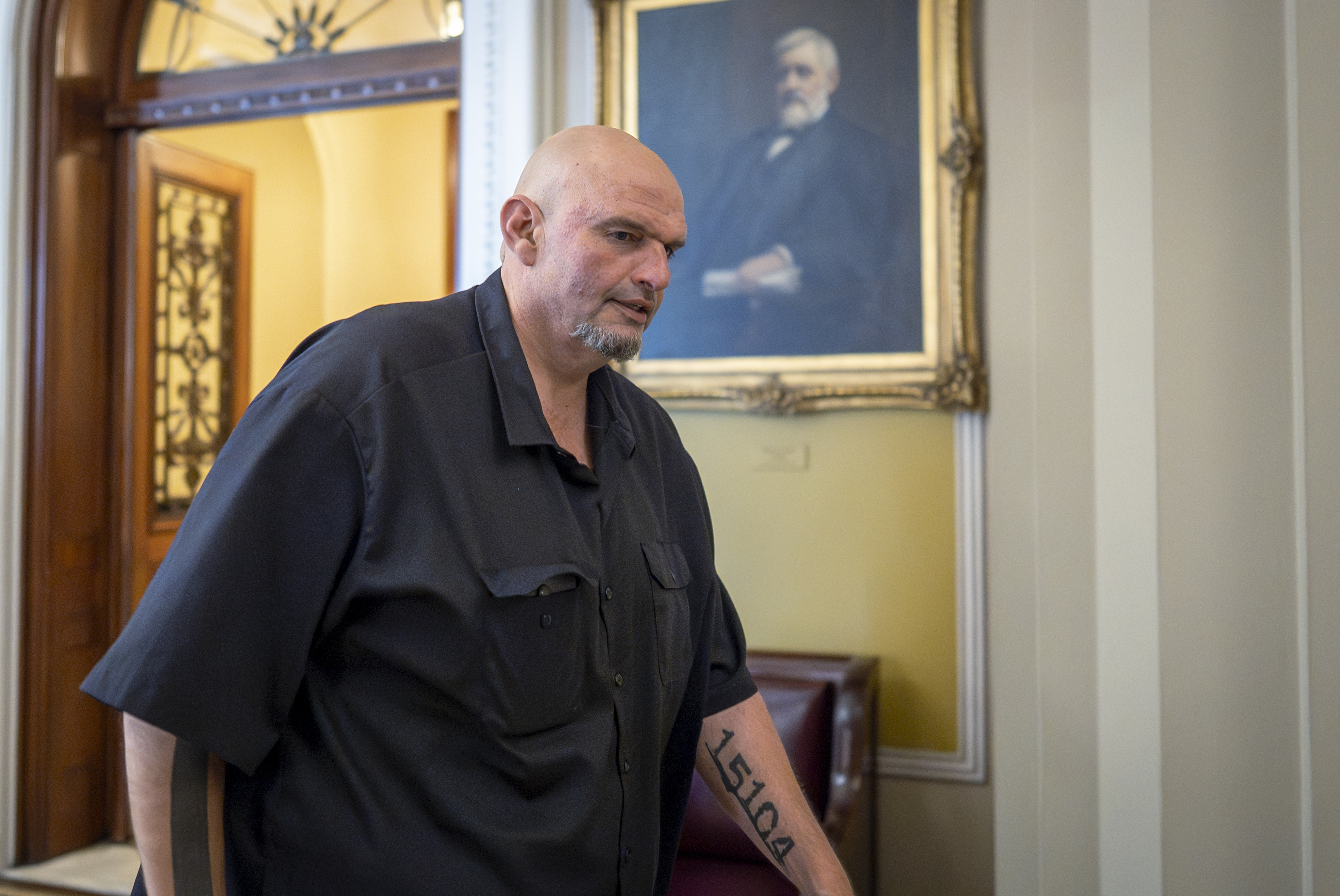 Sen. John Fetterman, D-Pa., leaves the chamber as the Senate holds a procedural vote on the nomination of Emil Bove, who served on President Donald Trump's criminal defense team, to be a U.S. Circuit Court judge for the 3rd U.S. Circuit Court of Appeals, at the Capitol in Washington, Thursday, July 24, 2025. 