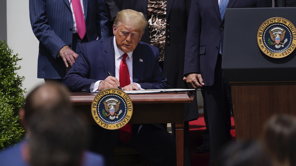 President Donald Trump signs new law that extends PPP, relaxes regulations