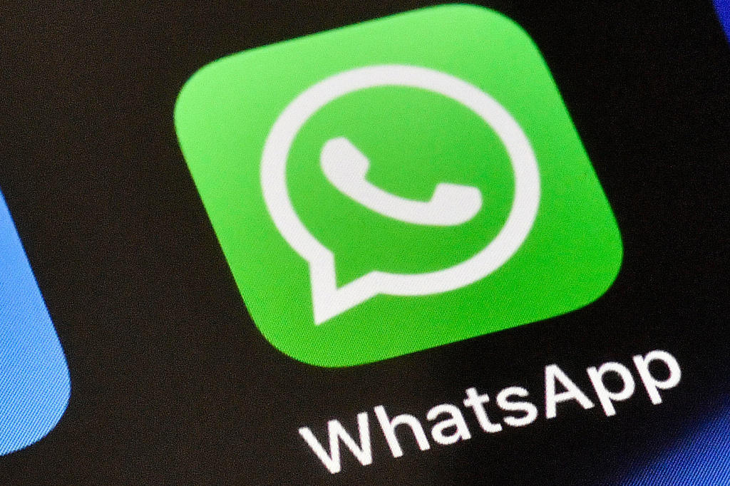 FILE - A WhatsApp icon is displayed on an iPhone, Nov. 15, 2018, in Gelsenkirchen, Germany. 