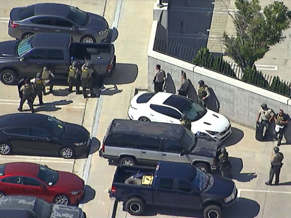 Police on the scene where a sheriff's deputy was shot heading to his car in a parking lot in Lancaster, Calif., Aug. 21, 2019 (KABC).