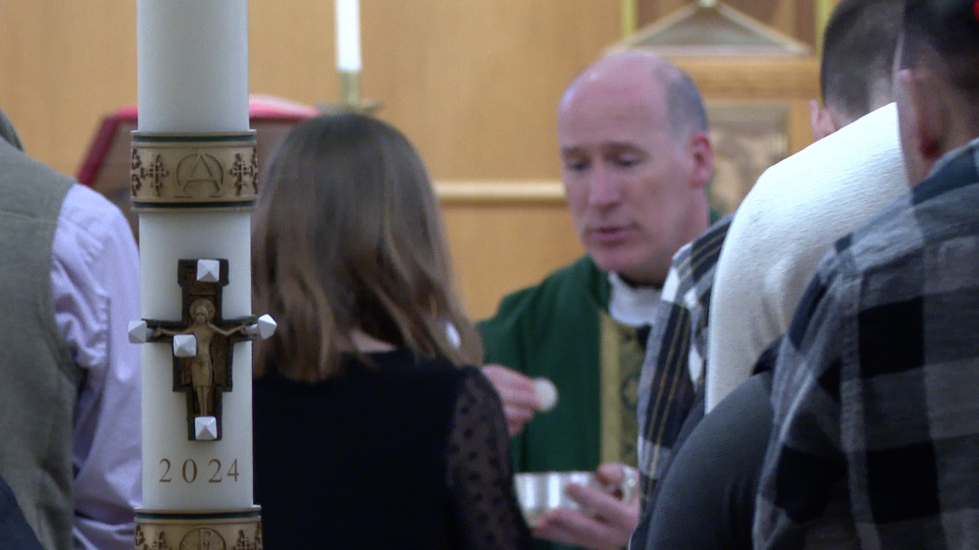 Eucharist during mass at St. John Catholic Student Center in East Lansing