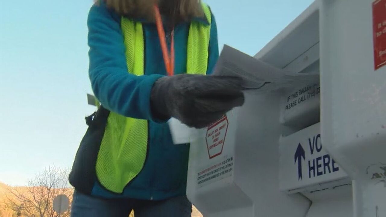 Ballot getting dropped off at a secure ballot drop box in El Paso County.