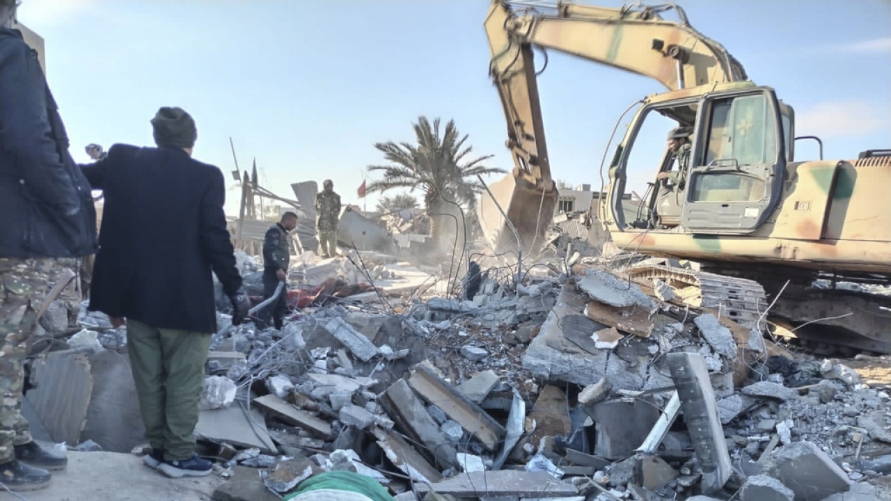 Members of Iraqi Shiite Popular Mobilization Forces in the rubble.