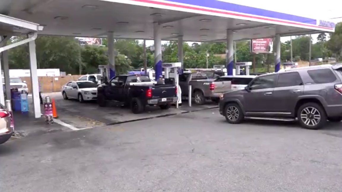 Cars waiting for gas.png