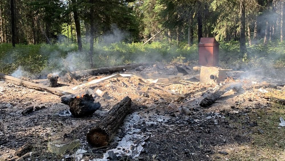 The historic Ford Creek patrol cabin was a total loss when rangers arrived on scene. 